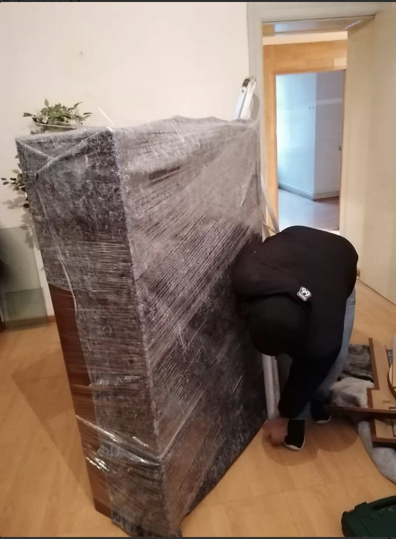 Professionell eingewickelte Möbel - Verpackungsservice MG Umzüge Berlin